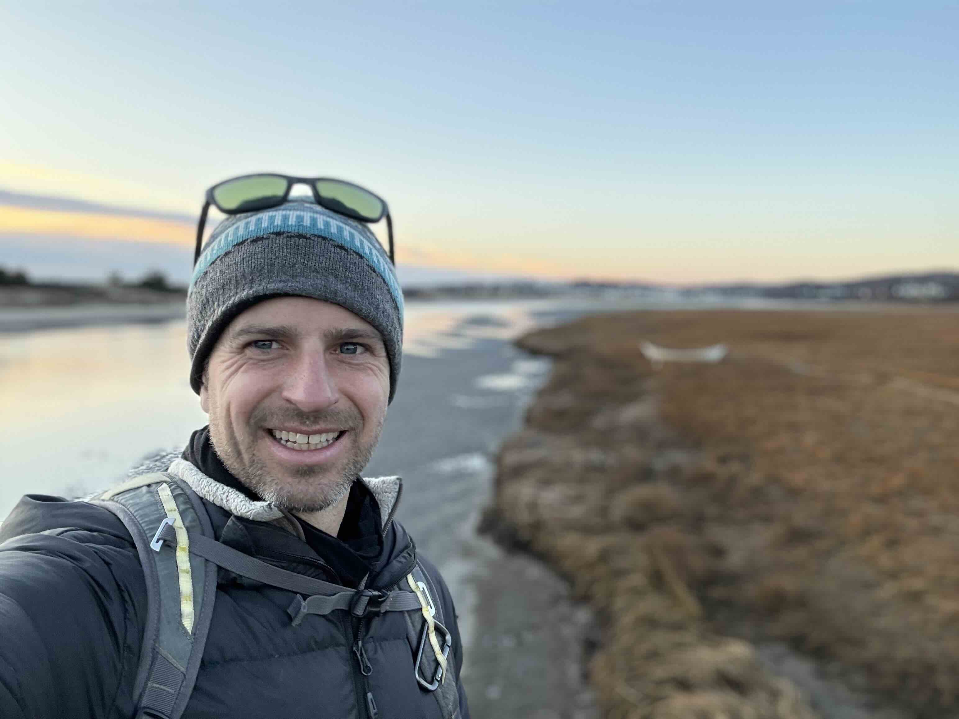 Jeff Lindbom walking on a winter beach